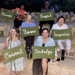 Escape to THRIVE 2023 attendees on steps with pillows